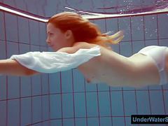 KiloPics.net presents: Redhead in a white dress and sexy bikini