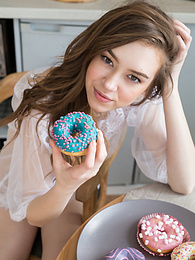 KiloPics.net presents: If you are a fan of skinny girls, check out how this cute little doll poses and teases totally naked in the kitchen.