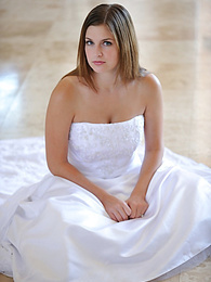 KiloPics.net presents: Busty glamorous amateur Danielle models wedding gown indoors & by the pool