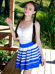 KiloPics.net presents: Fresh-Faced russian beauty Mia Grandy gets totally naked on a picnic table in a garden